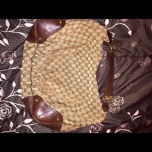A Gucci hobo bag used a couple of times
